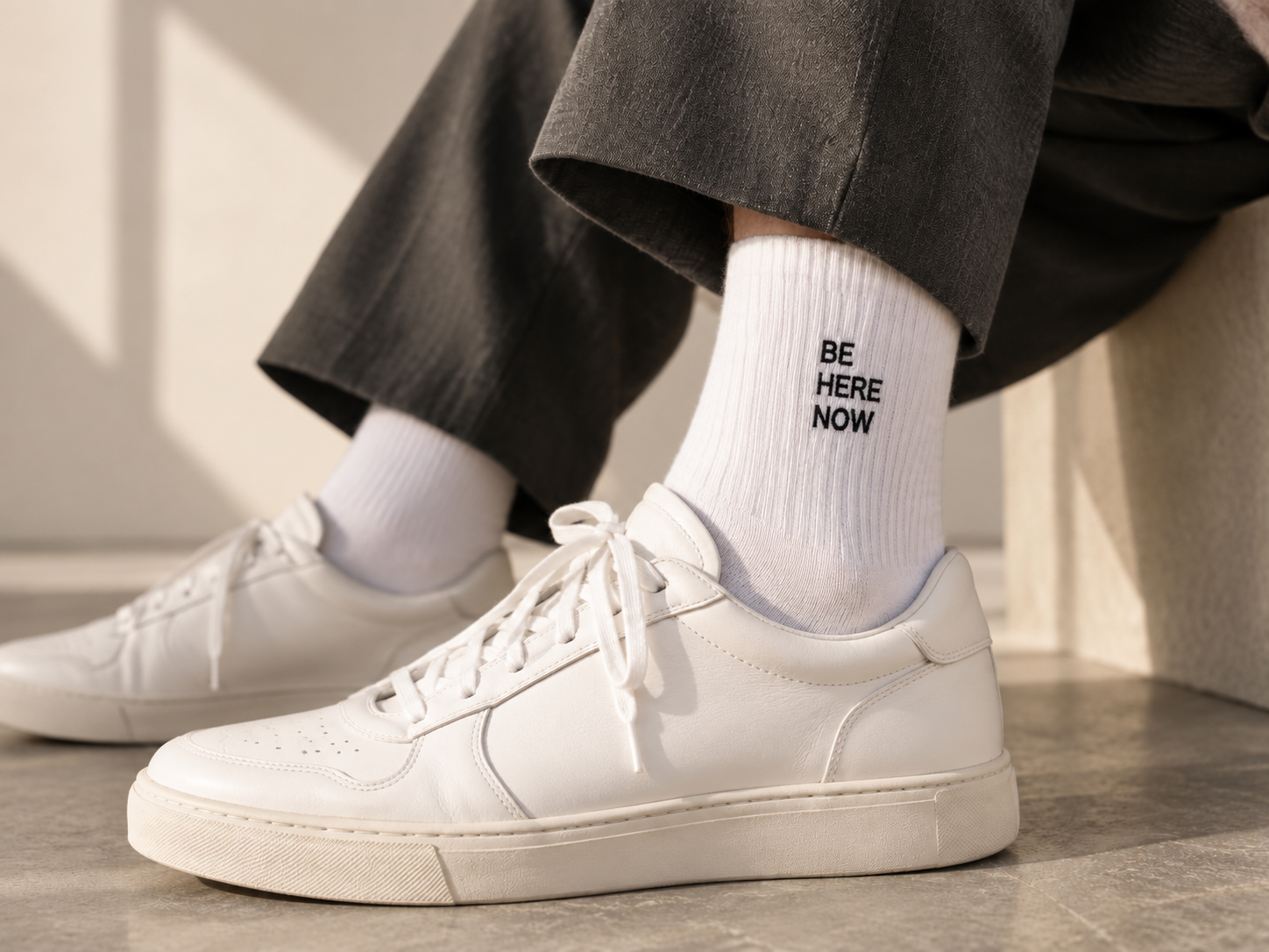Intent Wear affirmation socks styled with everyday clothing.
